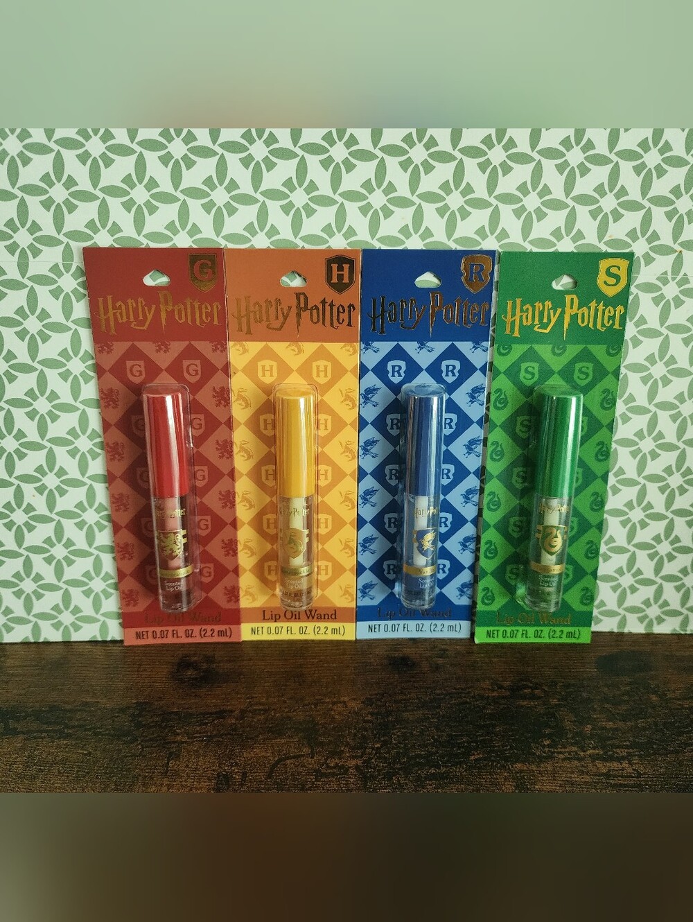 Warner Bros. Harry Potter House Lip Oils – Red, Yellow, Blue, Green